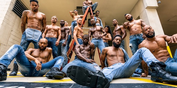 group of black male strippers posing for a picture